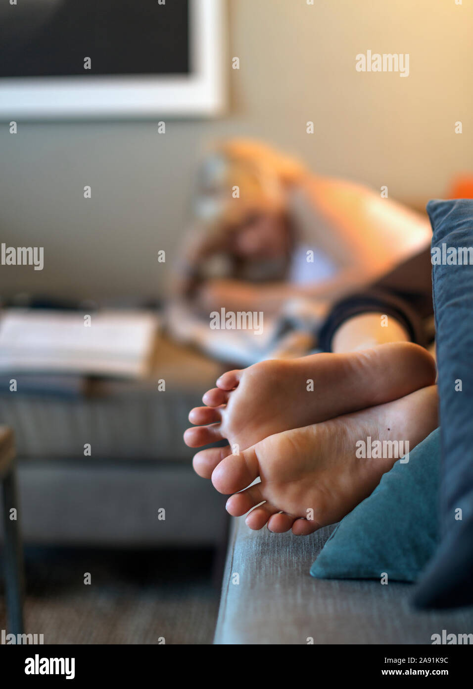 Girls feet and sofa hires stock photography and images Alamy