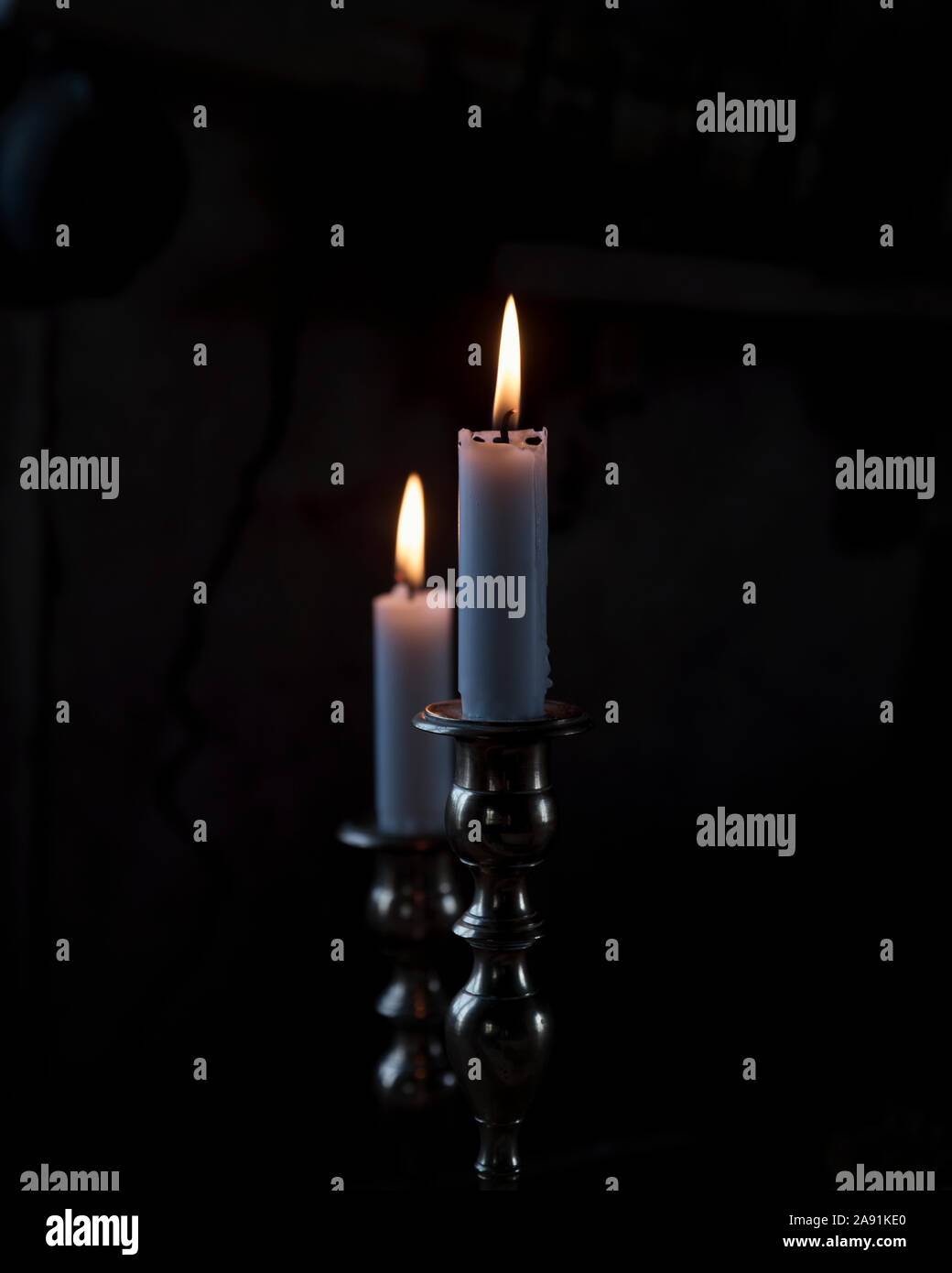 Candles in candlesticks Stock Photo Alamy