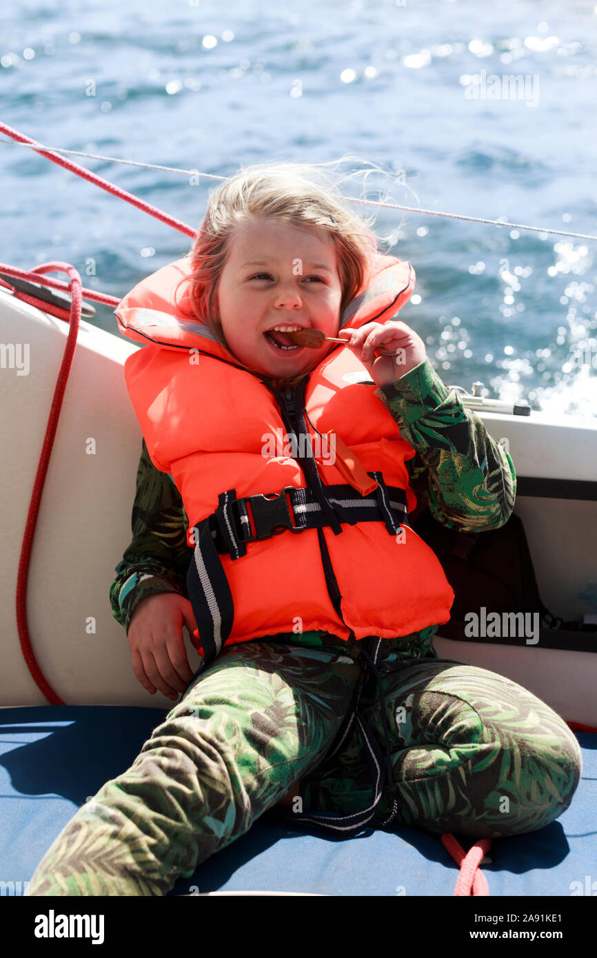 Smiling girl on boat Stock Photo