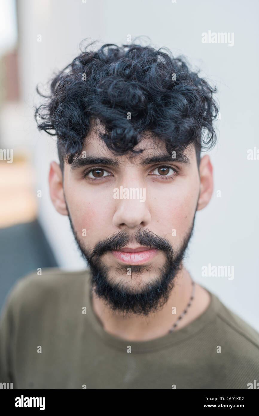 Portrait of man looking at camera Stock Photo - Alamy
