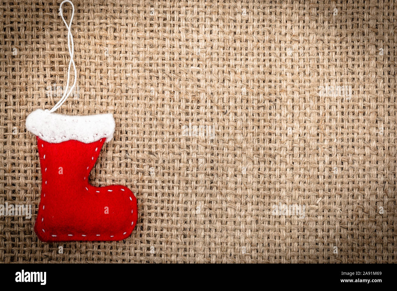Red santa claus boot, christmas backgrounds Stock Photo - Alamy