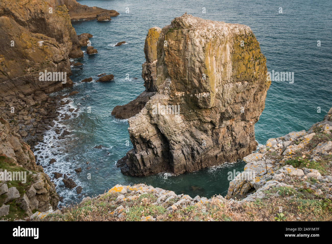 Sea stacks caused by coastal erosion on the shores of Pembrokeshire ...