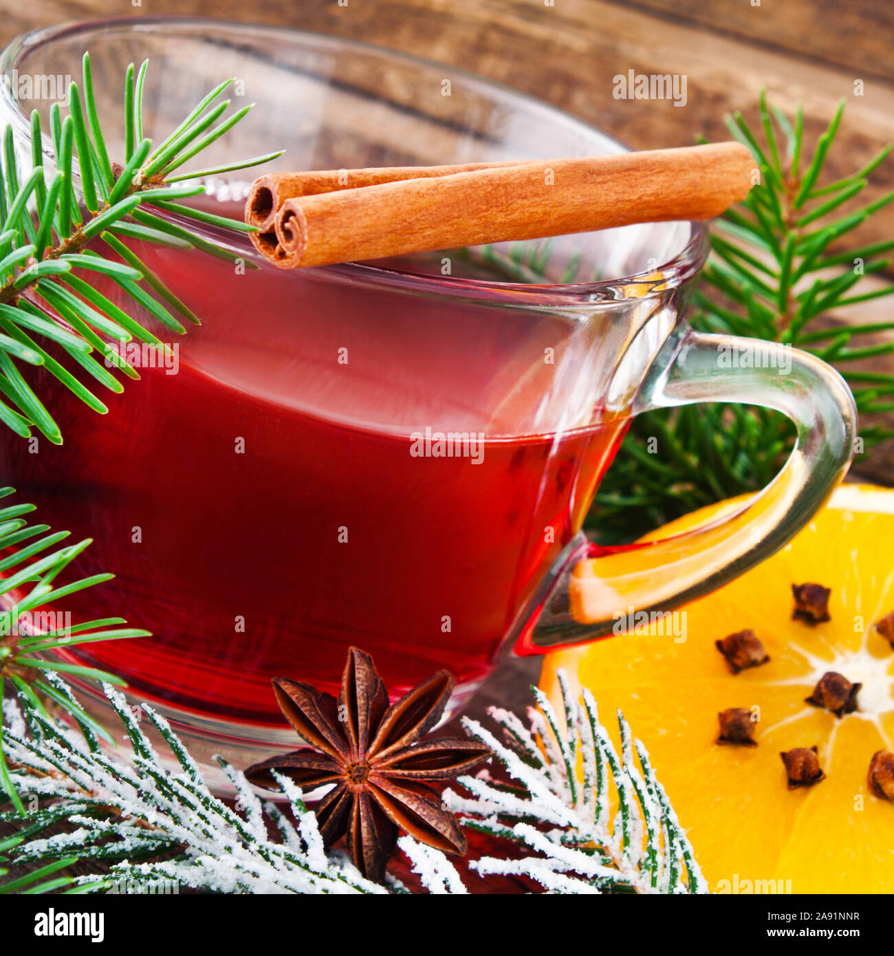 Hot spiced wine and cinnamon Stock Photo