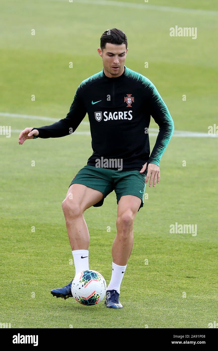 Oeiras, Portugal. 12th Nov, 2019. Portugal's forward Cristiano Ronaldo in action during a training session at Cidade do Futebol (Football City) training camp in Oeiras, Portugal, on November 12, 2019, ahead of the UEFA EURO 2020 qualifier match against Lithuania. Credit: Pedro Fiuza/ZUMA Wire/Alamy Live News Stock Photo
