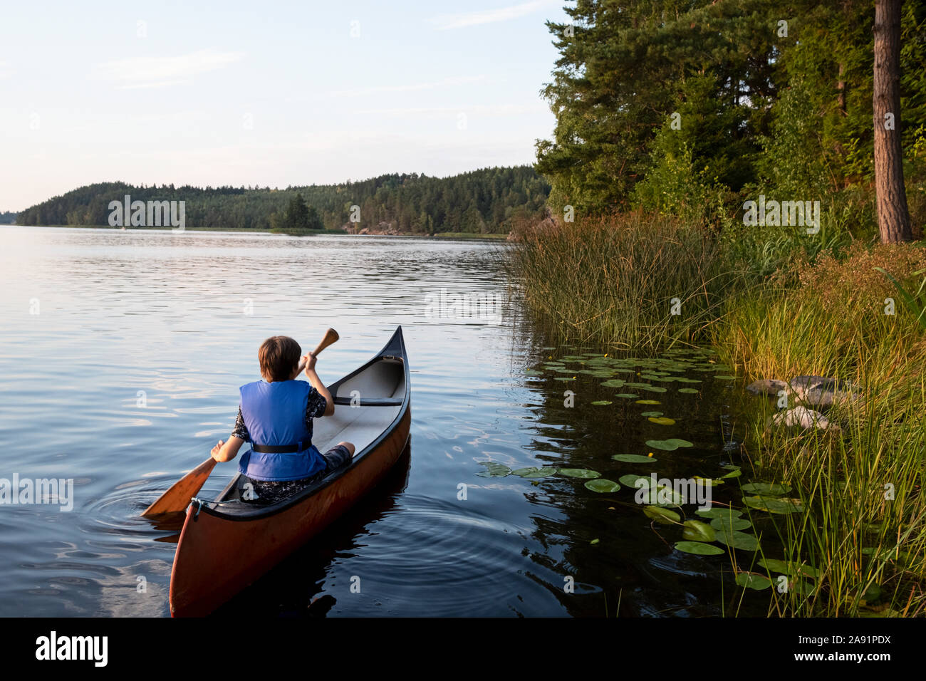Boy kayaking Stock Photo
