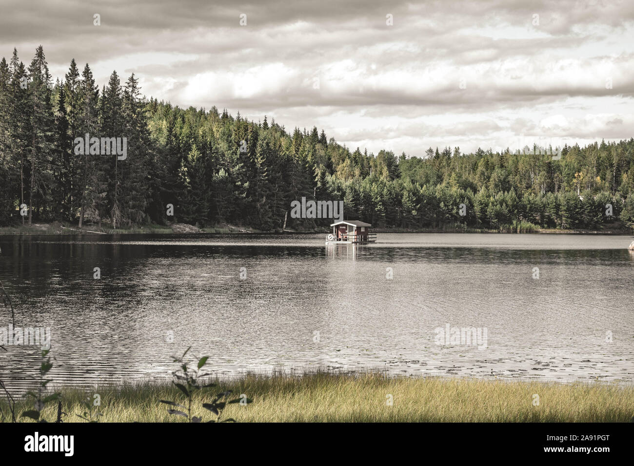 Cabin on the water, Nykroppa Sweden - Swedish forrest nature - beautiful moody landscape Stock Photo