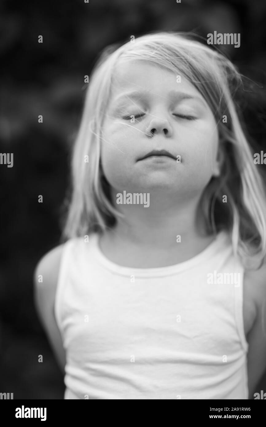 Portrait of girl with eyes closed Stock Photo Alamy