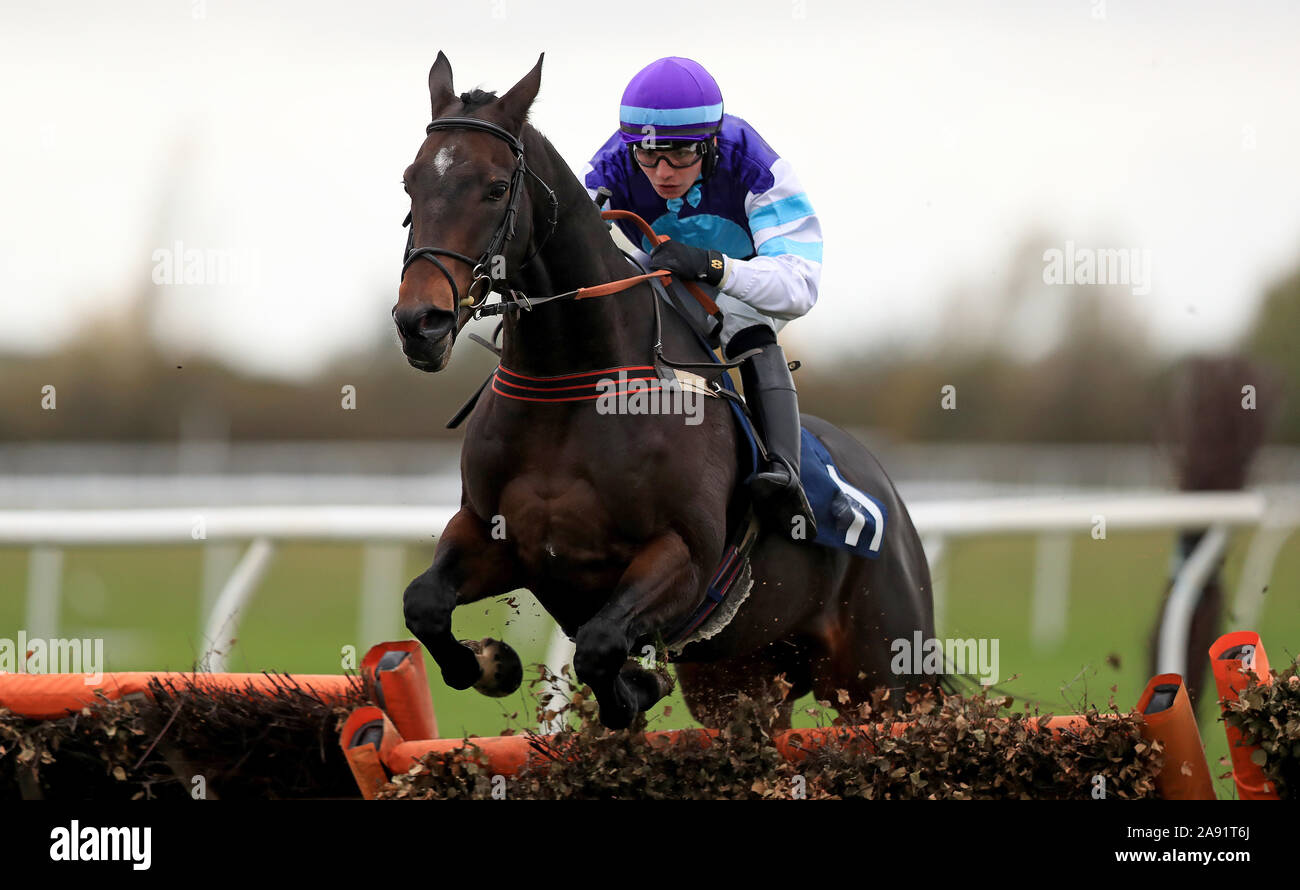 Highly Prized ridden by Ben Jones jumps the last to win The Integral UK Michaelmas Handicap Hurdle at Huntingdon Racecourse. Stock Photo