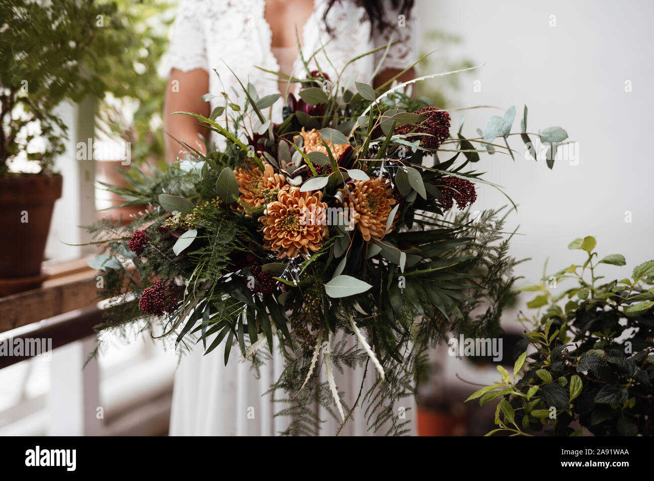 Bride holding flowers Stock Photo