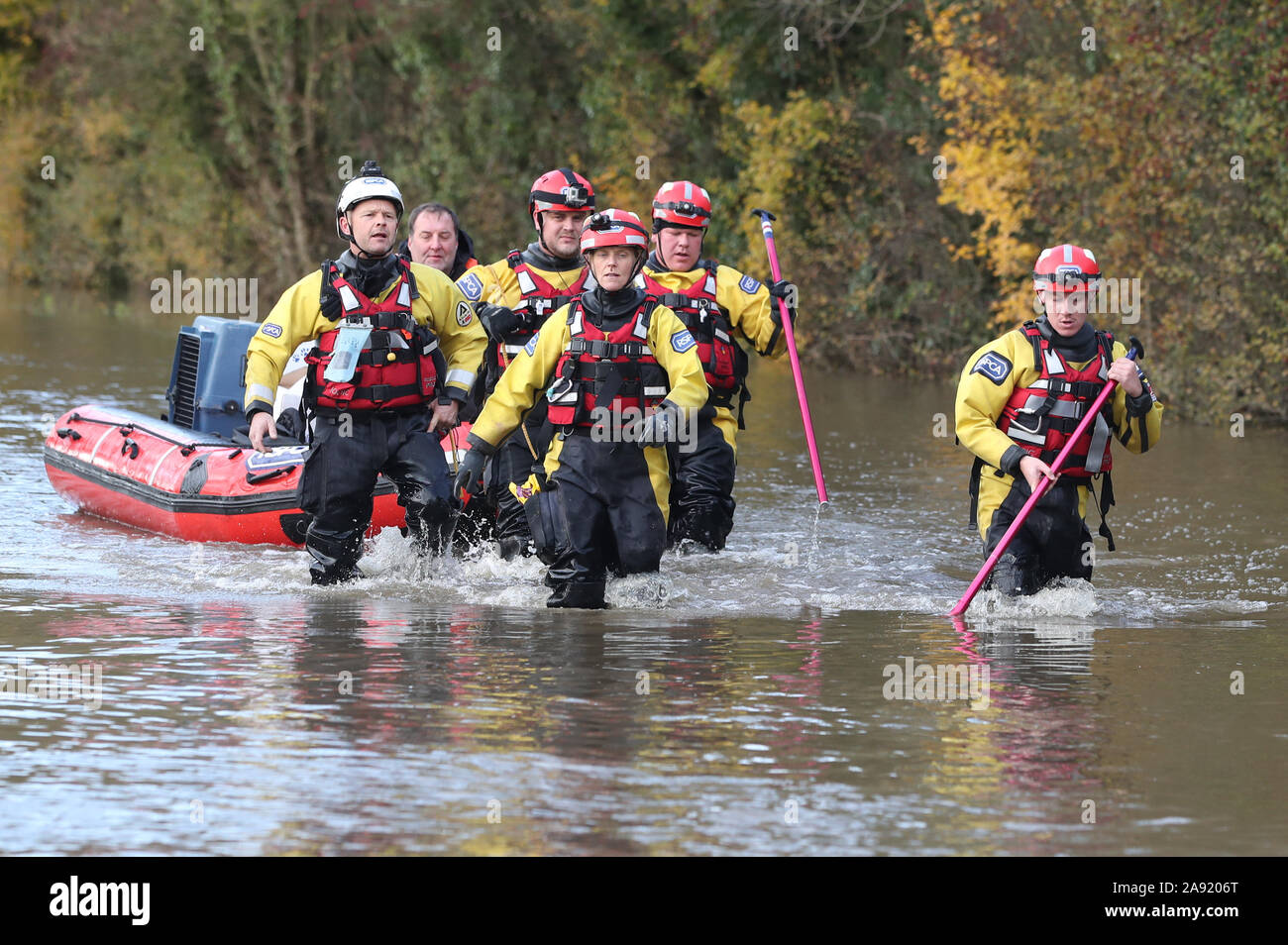 Rescuers pull a boat through floodwater in Fishlake, Doncaster. The Prime Minister is set to chair a meeting of the Government's emergency committee after severe flooding in parts of the country, where rain is finally expected to ease this afternoon. Stock Photo