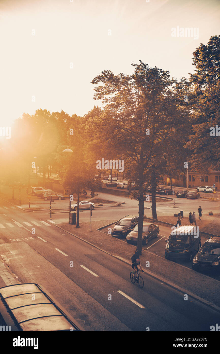 City street at sunset Stock Photo - Alamy