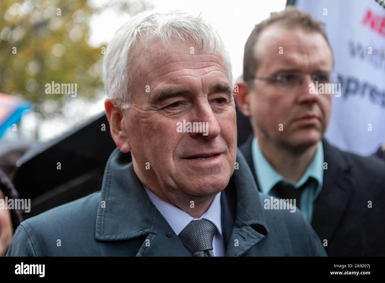 Downing street, Westminster, London, UK. 12th Nov, 2019. Shadow chancellor John McDonnell joins the workers outside Downing Street. Struggling McDonald's workers outside Downing Street, strike for higher wages. Employees are demanding £15 per hour, to end youth rates, a choice of hours of up to 40 hours a week and four weeks notice for shift changes. Penelope Barritt/Alamy Live News Stock Photo