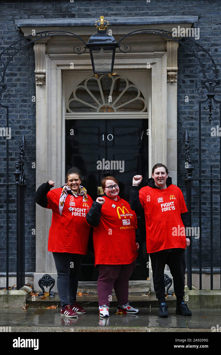 McDonald's workers deliver a petition to 10 Downing Street in Westminster, London, as they call for wages of ??15 an hour. Stock Photo