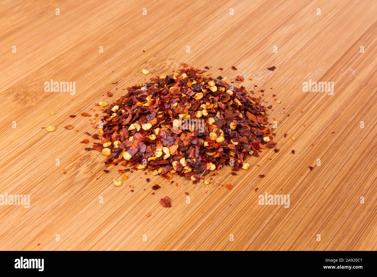 Pile of dehydrated crushed spicy red pepper seasoning Stock Photo Alamy