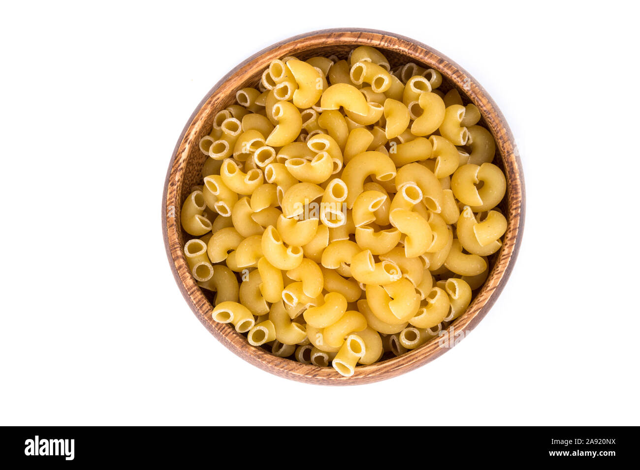 PIle of yellow dried elbow macaroni pasta shapes Stock Photo Alamy