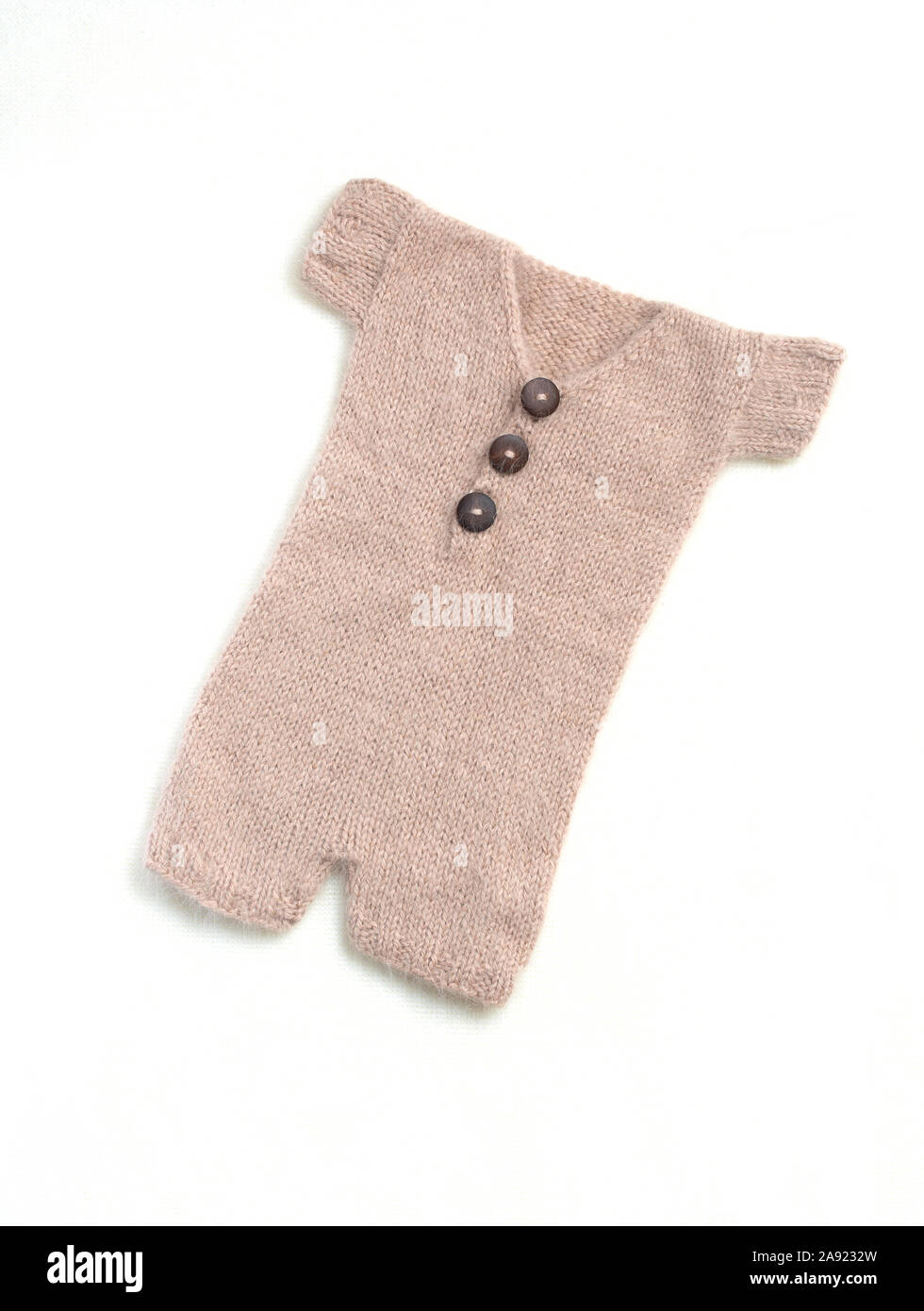 beige baby clothes