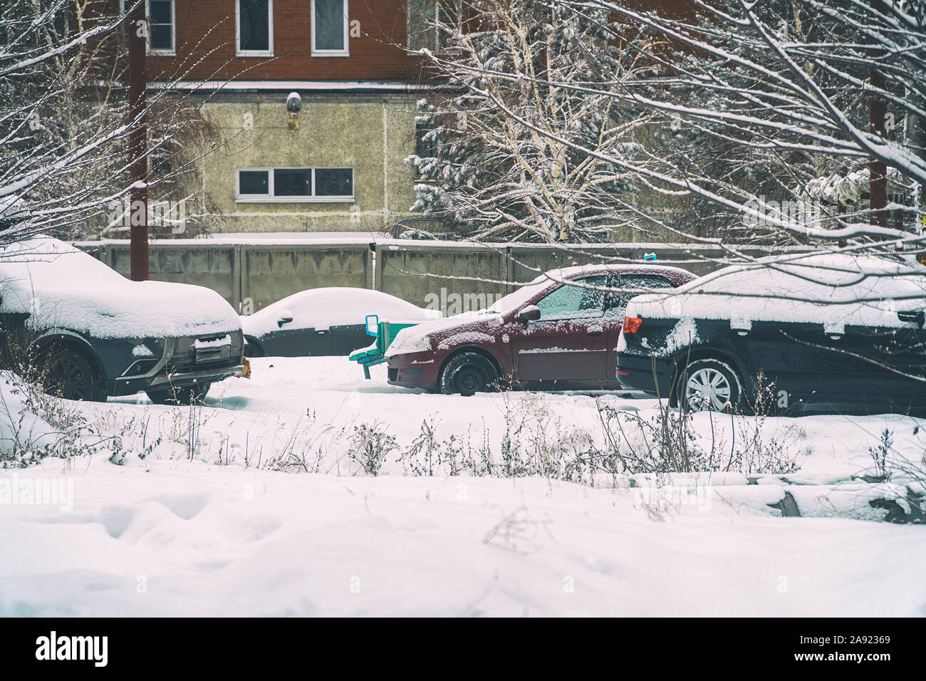 Cars under snow in the Parking lot Stock Photo - Alamy