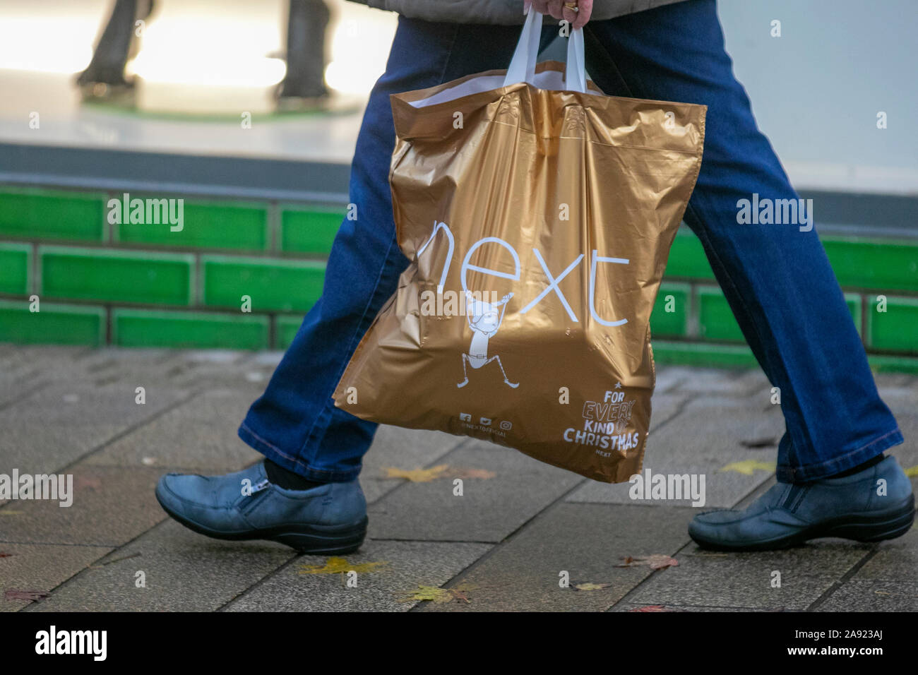 Next 100 recycled plastic reusable Christmas store Bags for Life, Fishergate, Preston, UK Stock