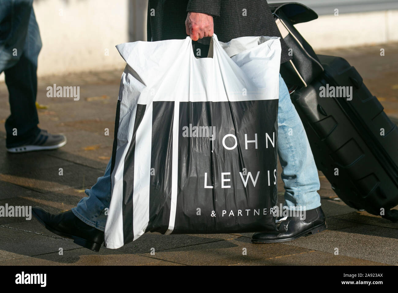 People going to John Lewis Vuitton store and buying a man bag