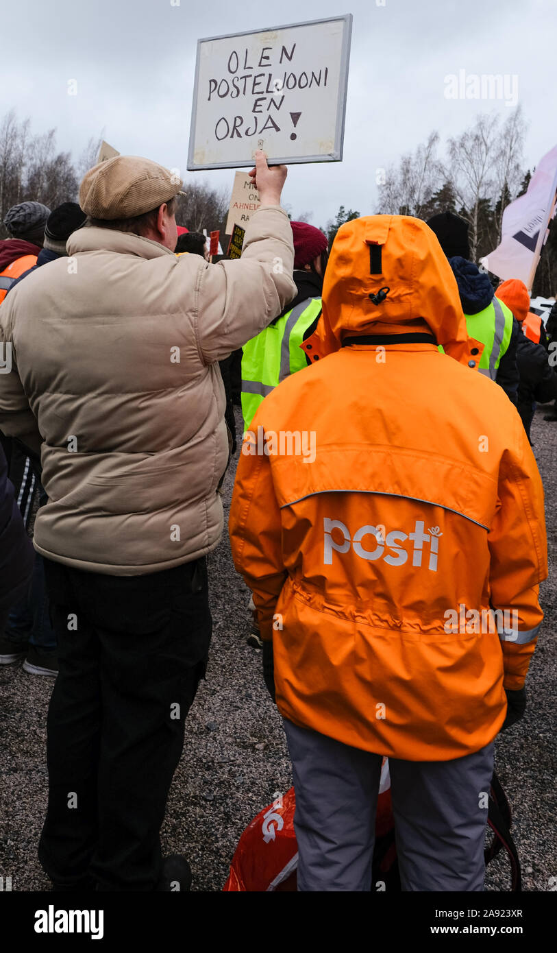 Postal strike in Finland 12.11.2019 Posti stikers march and to protest. The demonstration was called by the Finnish Post and Logistics Union (PAU) Stock Photo