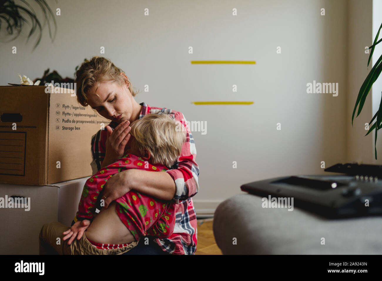 Mother comforting son Stock Photo