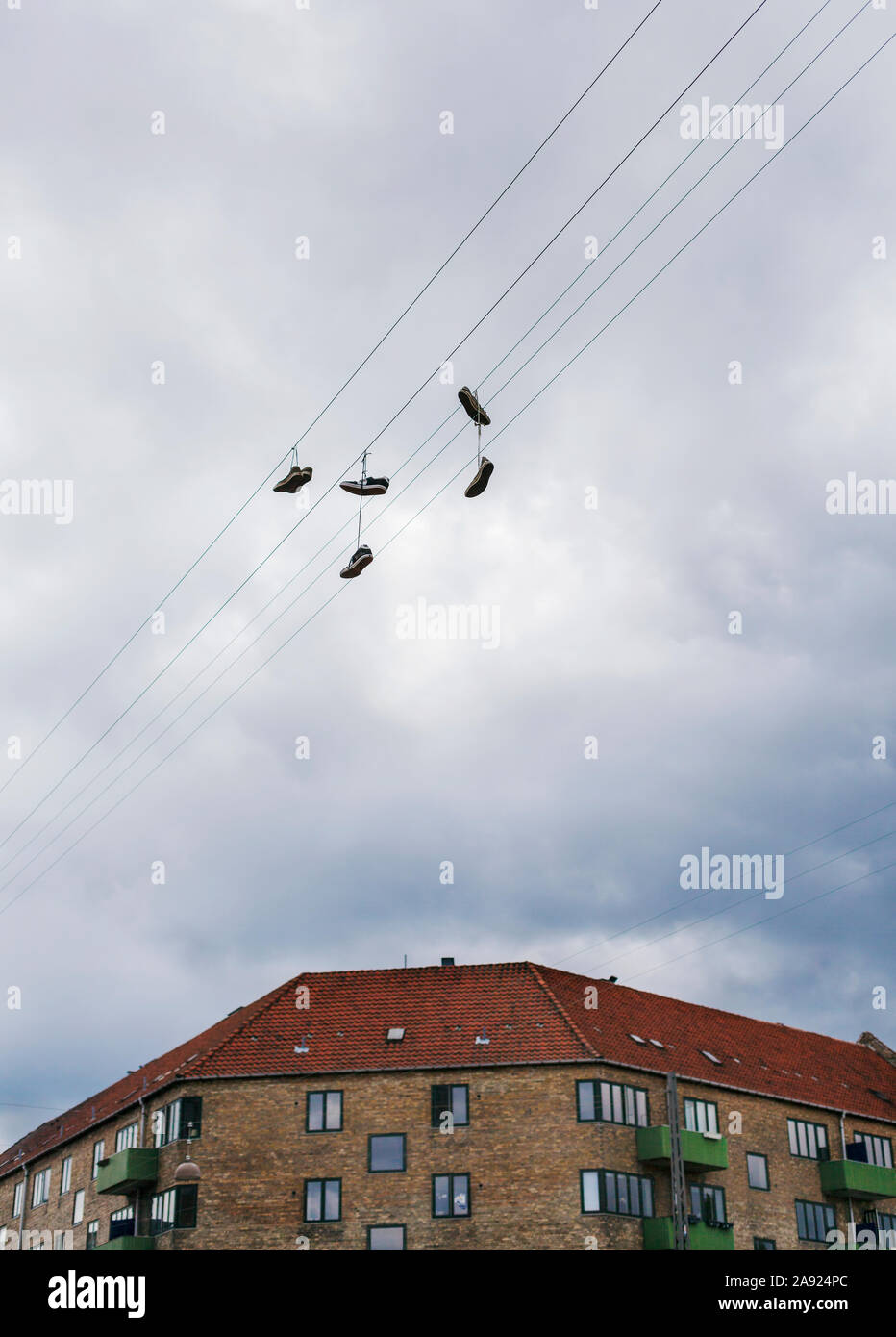 Shoes on telephone line hires stock photography and images Alamy