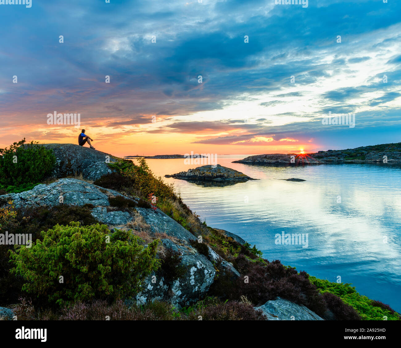 Sunset at sea Stock Photo - Alamy