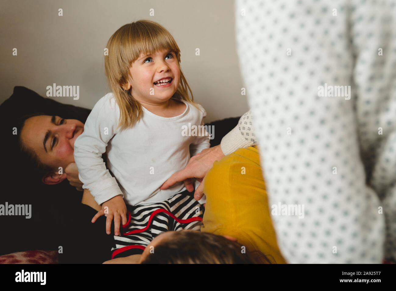 Mother playing with daughter Stock Photo