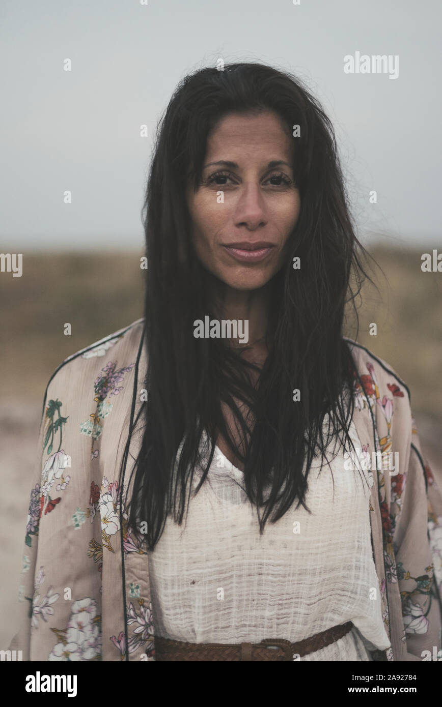 Portrait of smiling woman Stock Photo