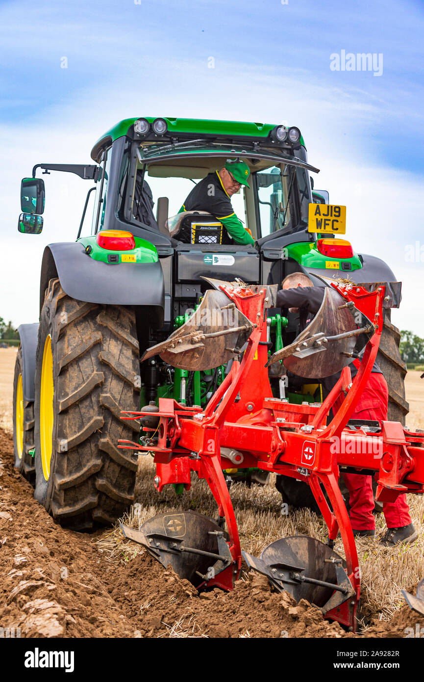 British National Ploughing Championships, Lincoln, UK. A modern reversable plough used to give
