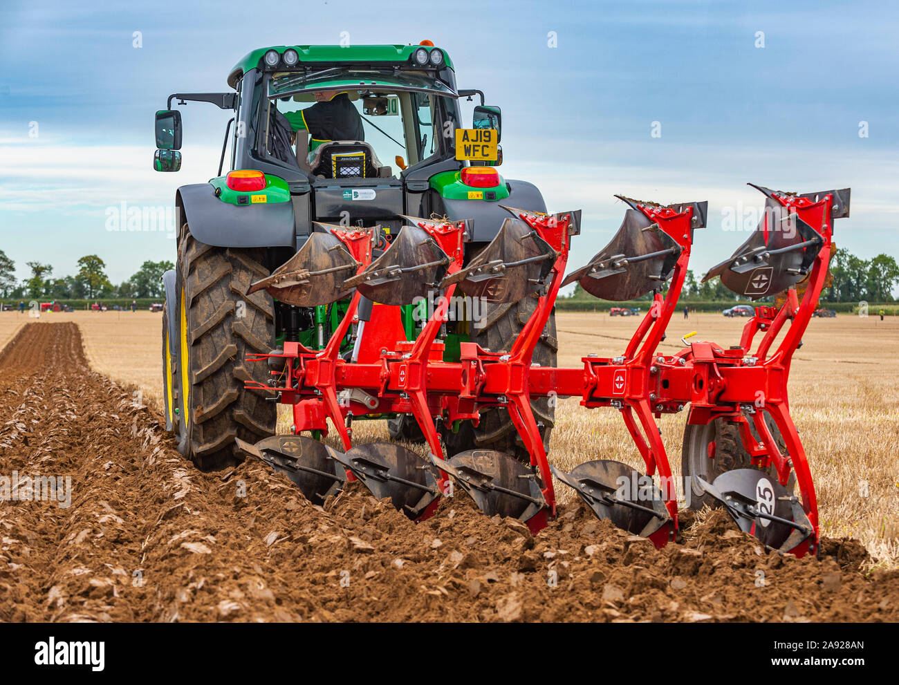British National Ploughing Championships, Lincoln, UK. A modern reversable plough used to give