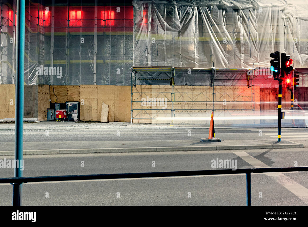 Traffic lights near empty road Stock Photo