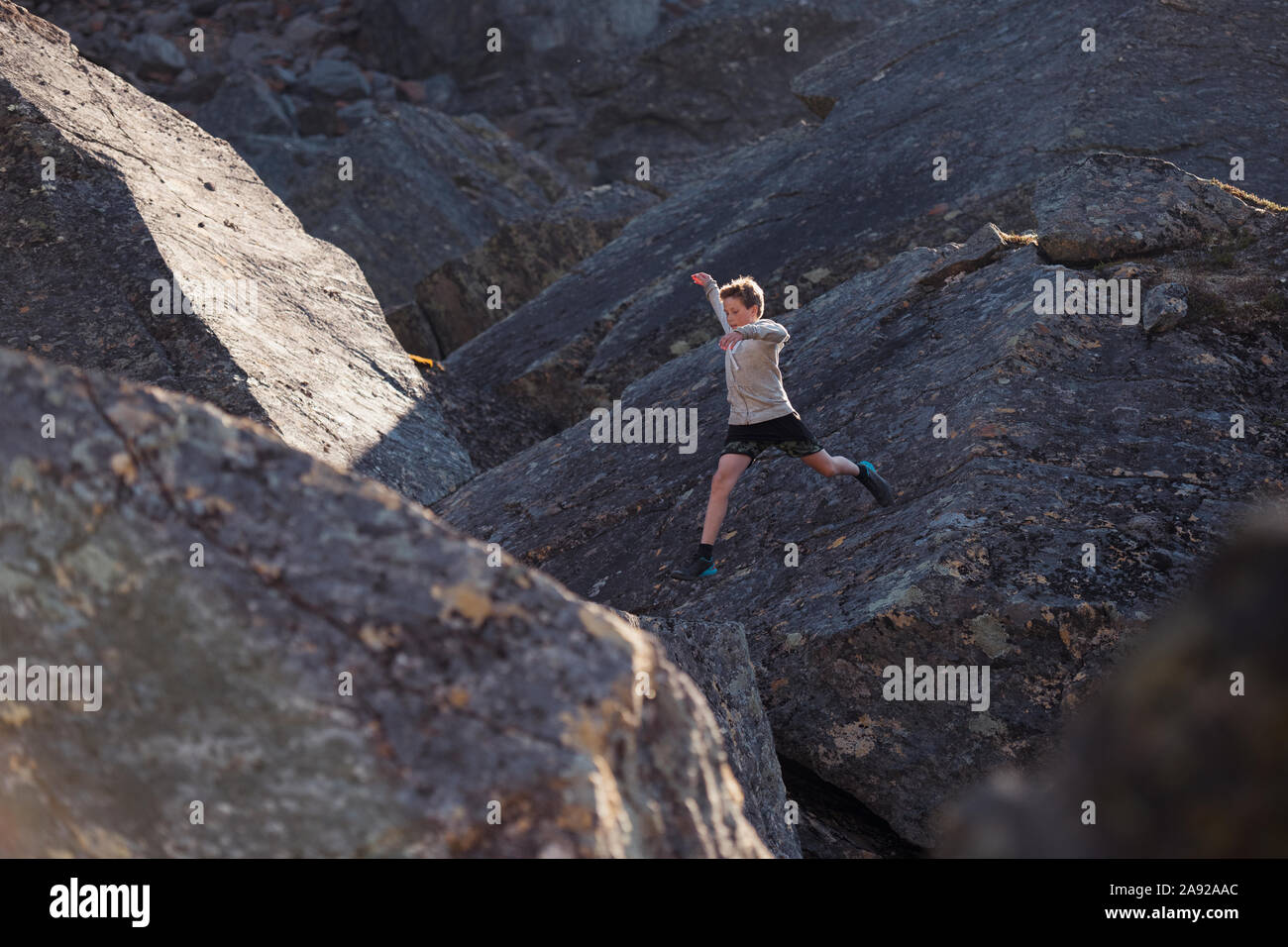 Boy in mountains Stock Photo