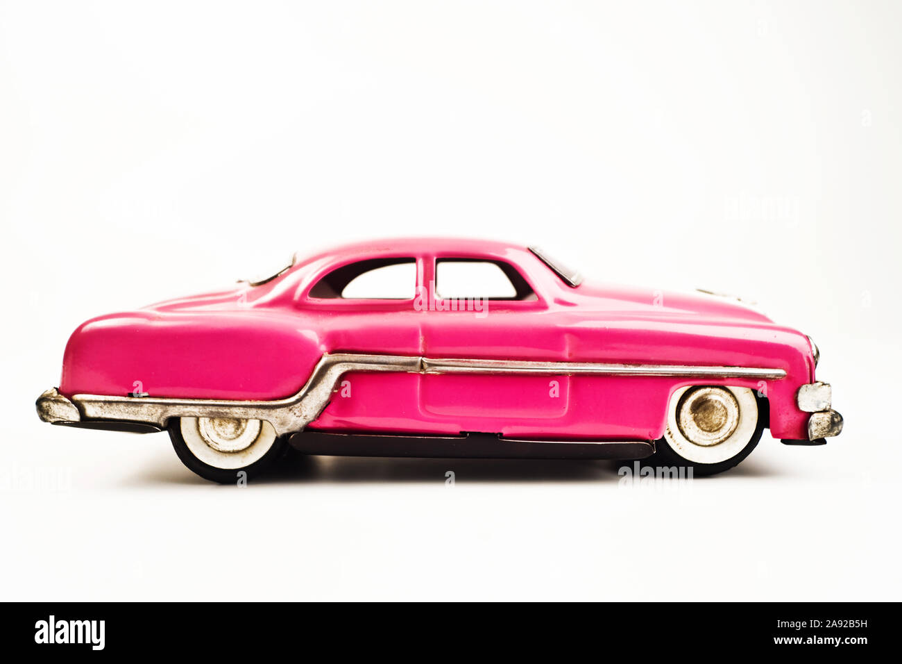 Altes Blechspielzeug, Auto, Oldtimer, pink, USA, Stock Photo