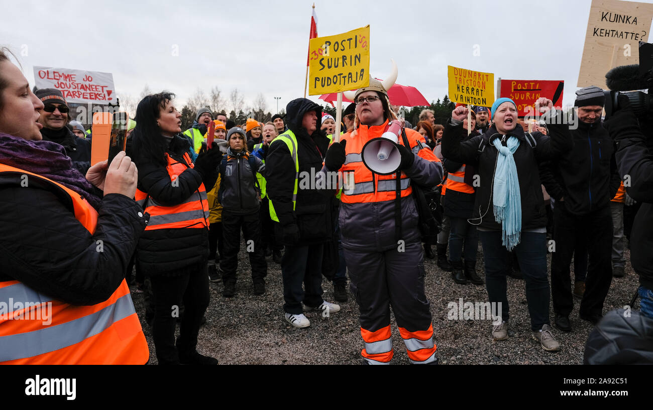 Postal strike in Finland 12.11.2019 Posti stikers march and to protest. The demonstration was called by the Finnish Post and Logistics Union (PAU) Stock Photo