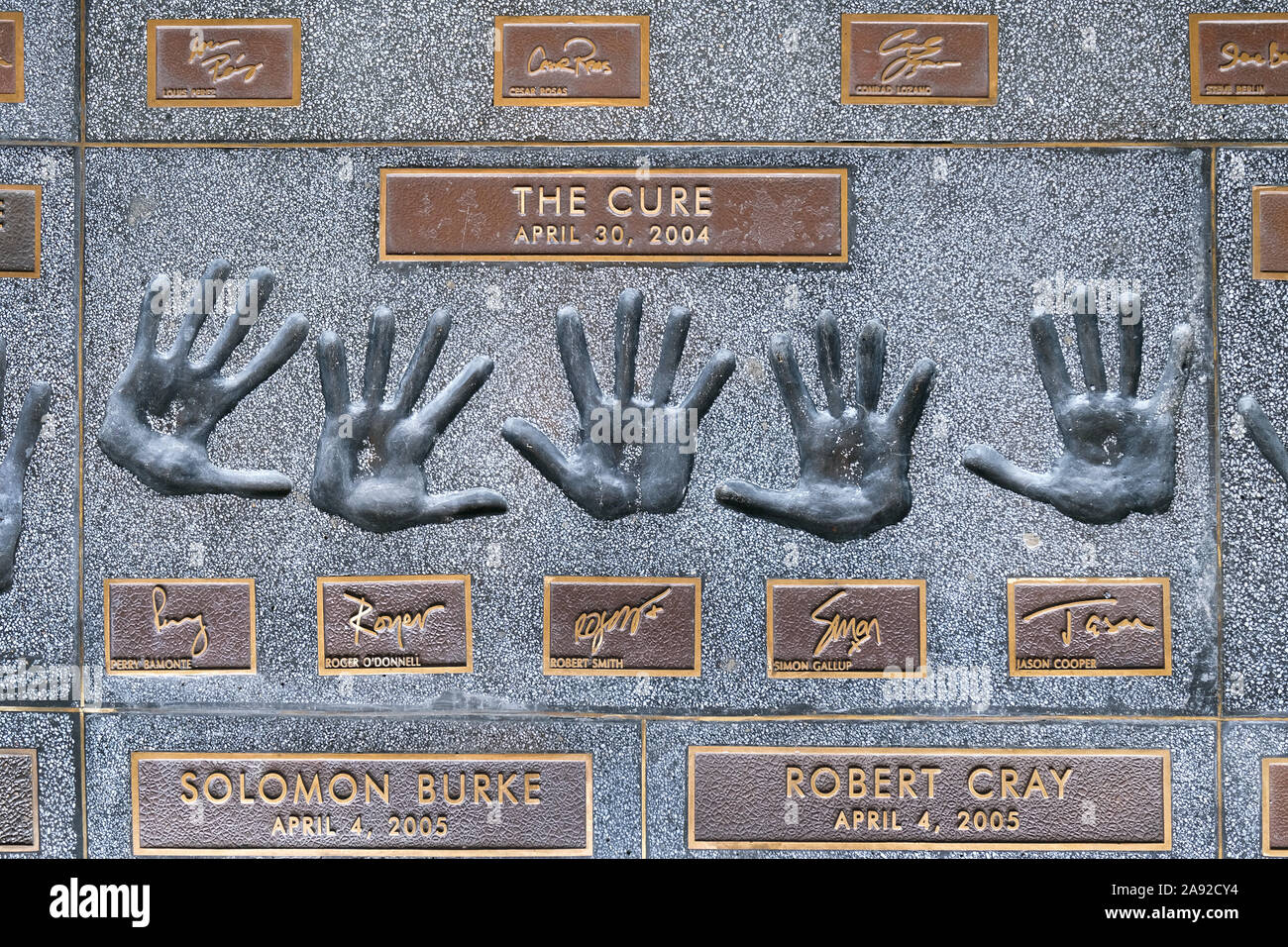 Handprints of the Band The Cure on the Rock Walk of the Guitar Center Music Store on Sunset Boulevard Hollywood, Los Angeles, California, USA Stock Photo