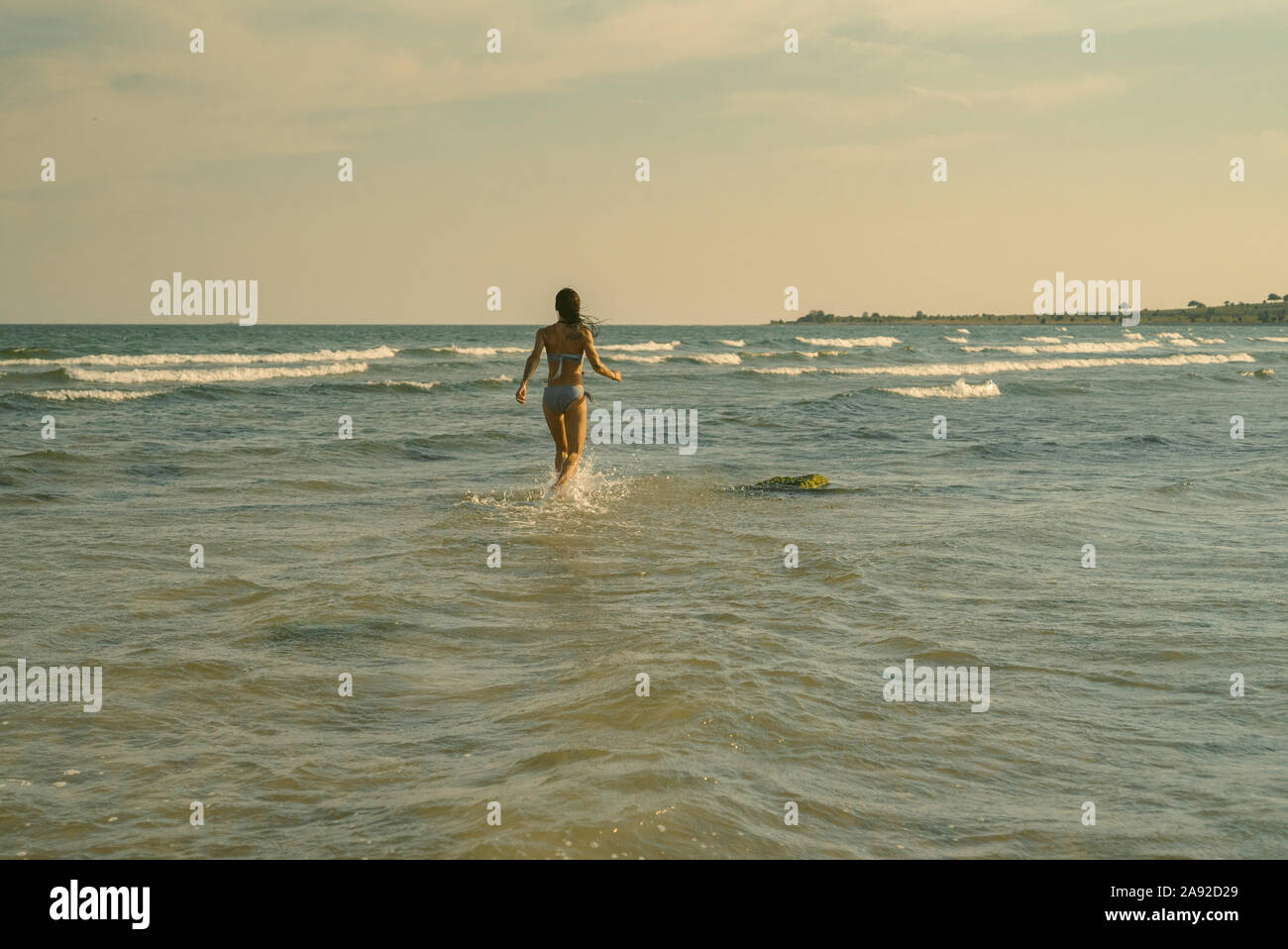 Mature woman in bikini hi-res stock photography and images - Alamy