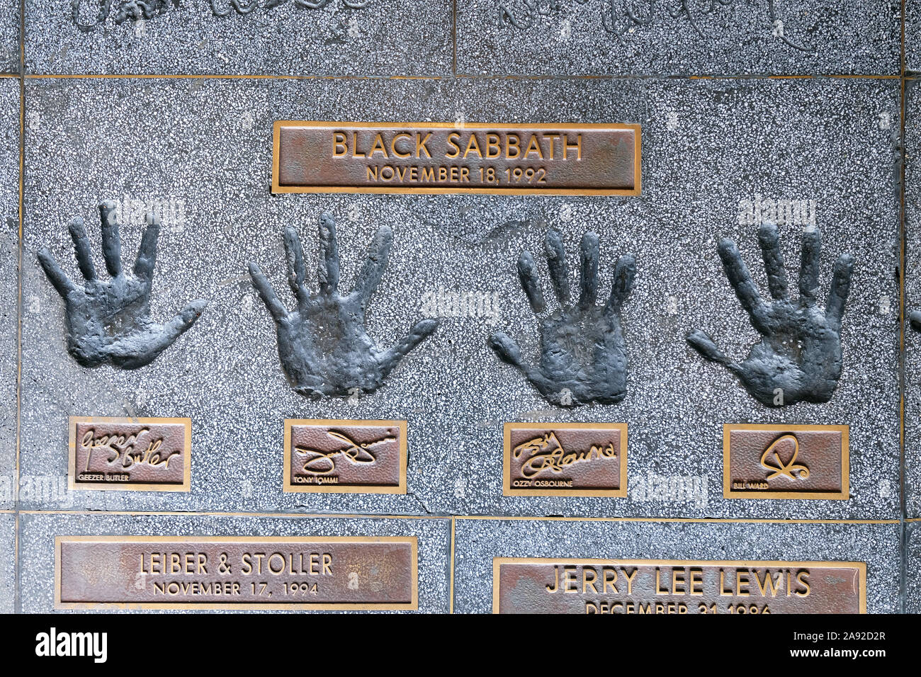 Handprints of the Band Black Sabbath on the Rock Walk of the Guitar Center Music Store on Sunset Boulevard Hollywood, Los Angeles, California, USA Stock Photo