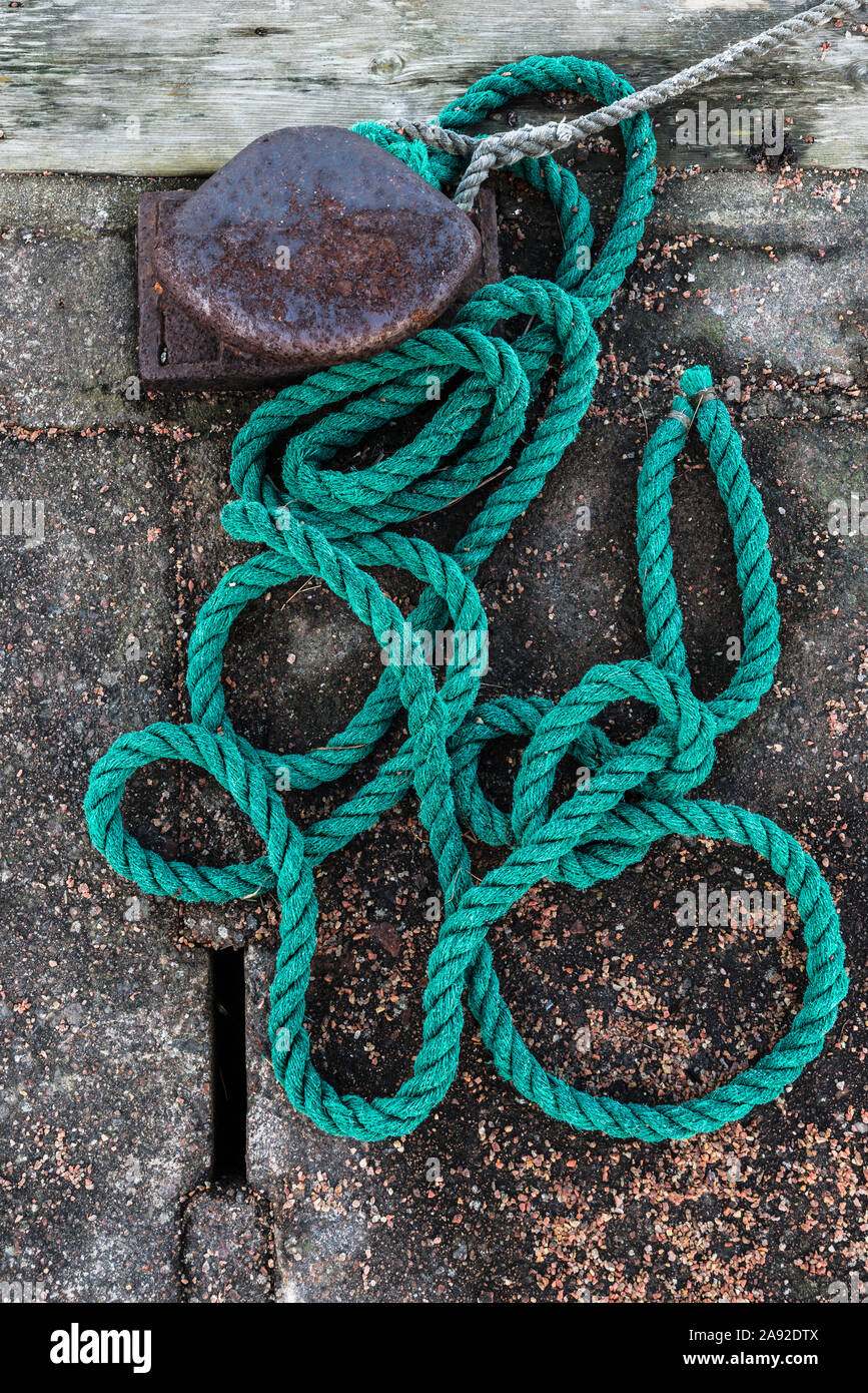 Rope near bollard Stock Photo