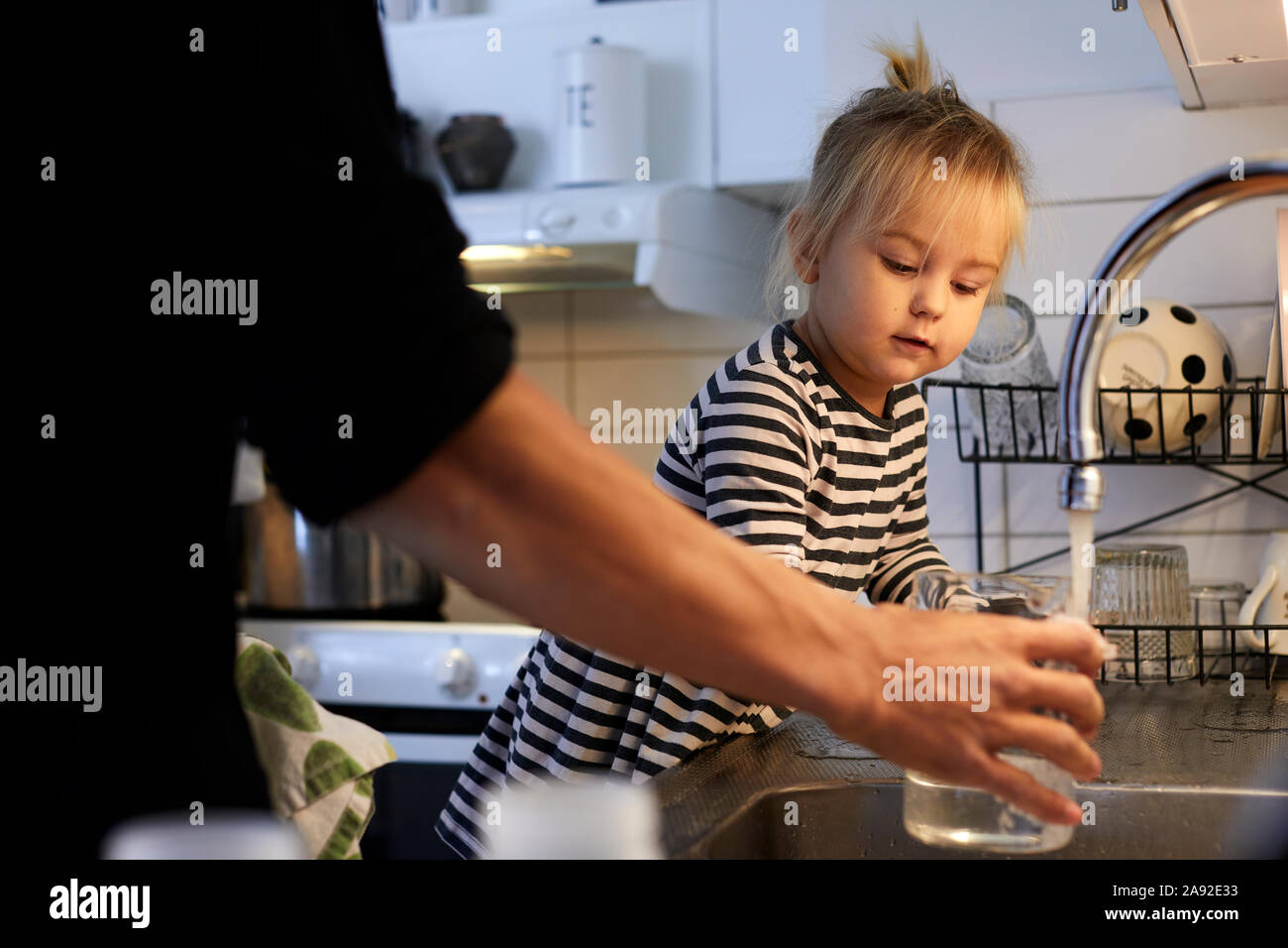 Girl in kitchen Stock Photo