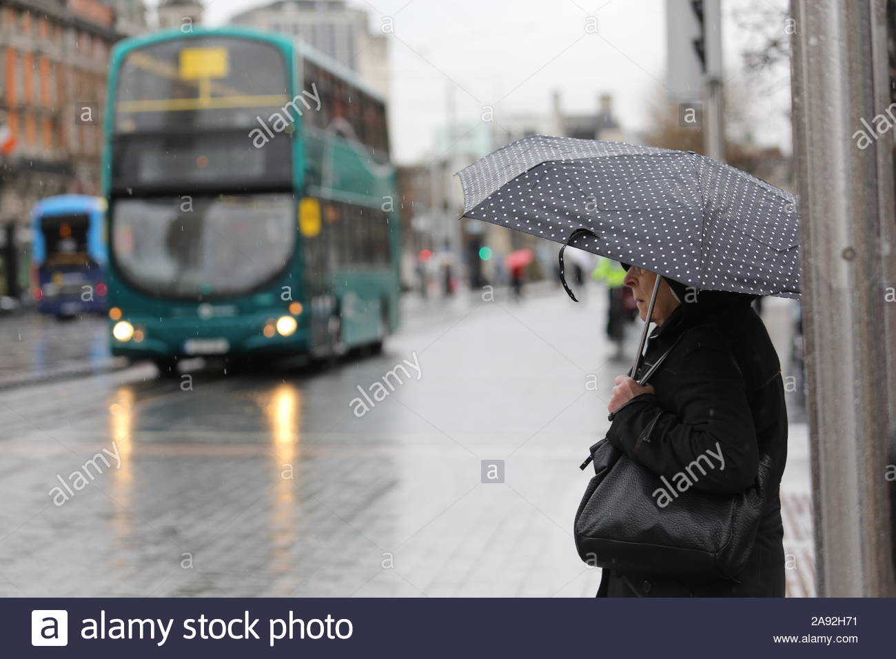 A rainy day in Dublin as umbrella come out against the latest wet weather. Stock Photo