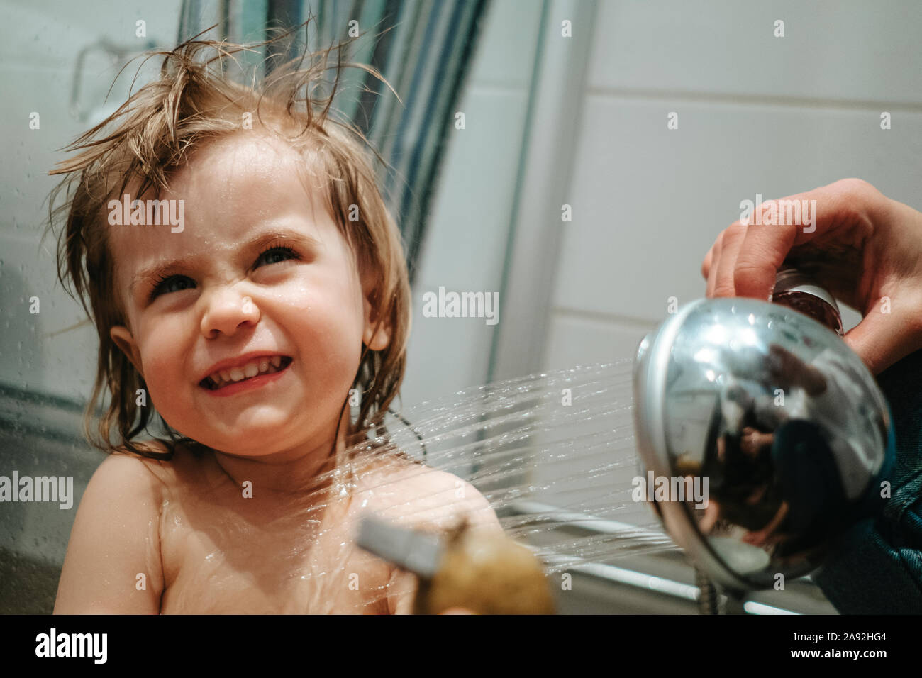 Happy girl having shower Stock Photo