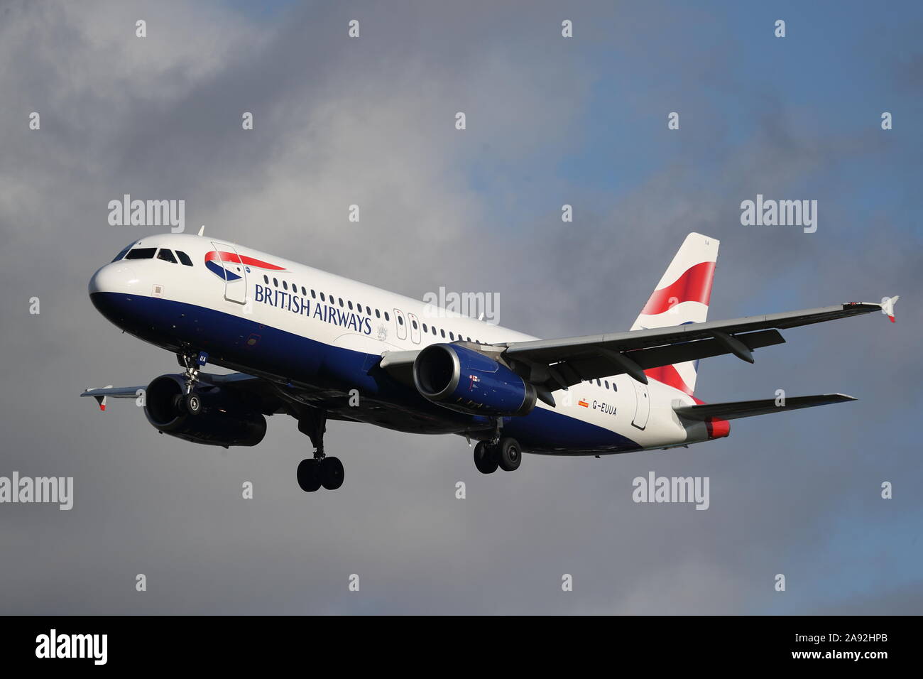 British Airways Airbus A320-200 G-EUUA landing at London Heathrow Airport, UK Stock Photo