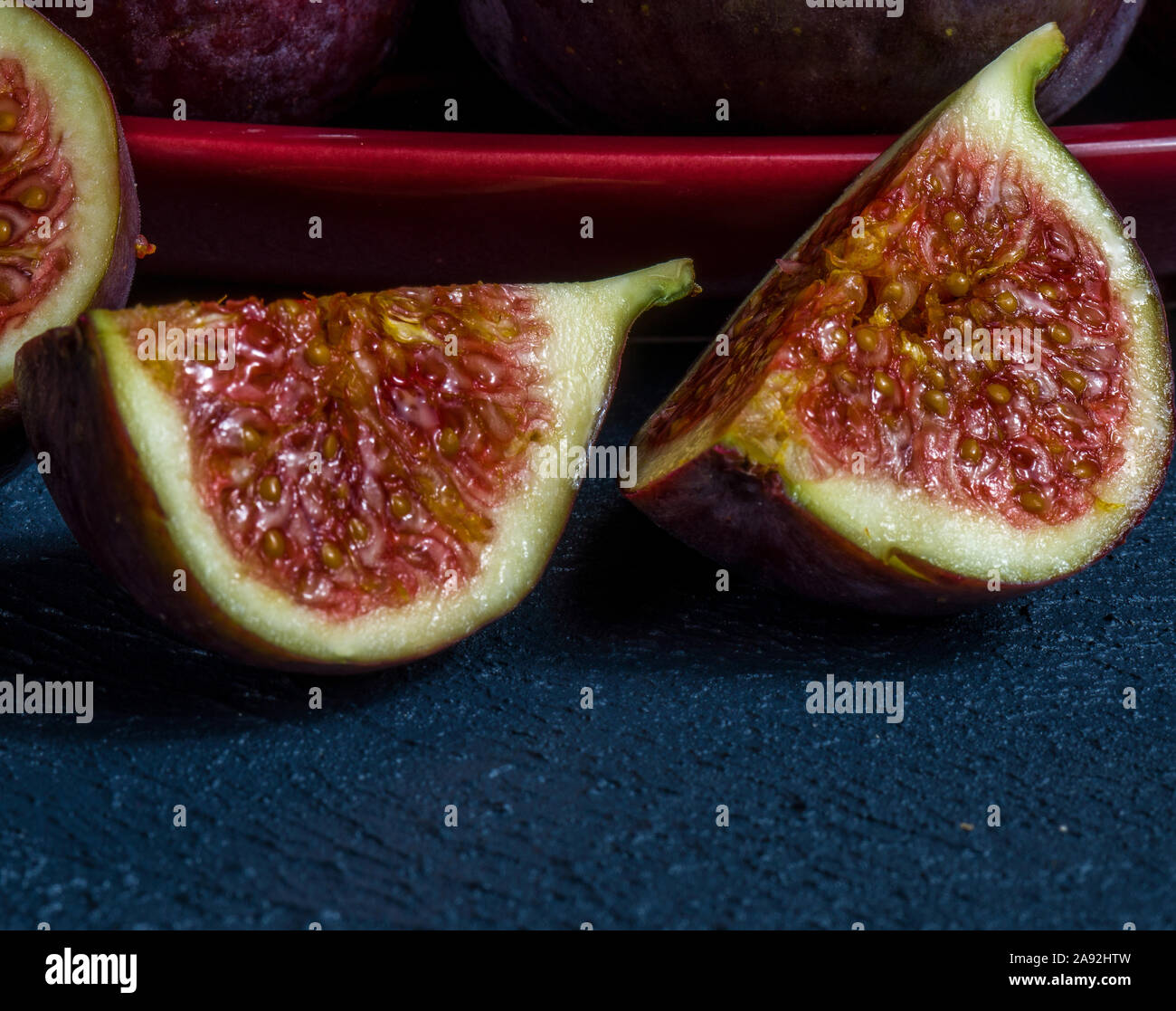 fresh figs close-up on black background. dark moody photo Stock Photo