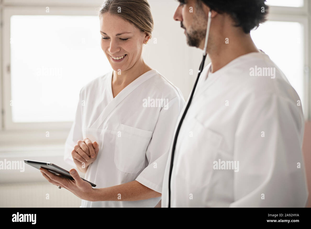 Doctors using digital tablet Stock Photo