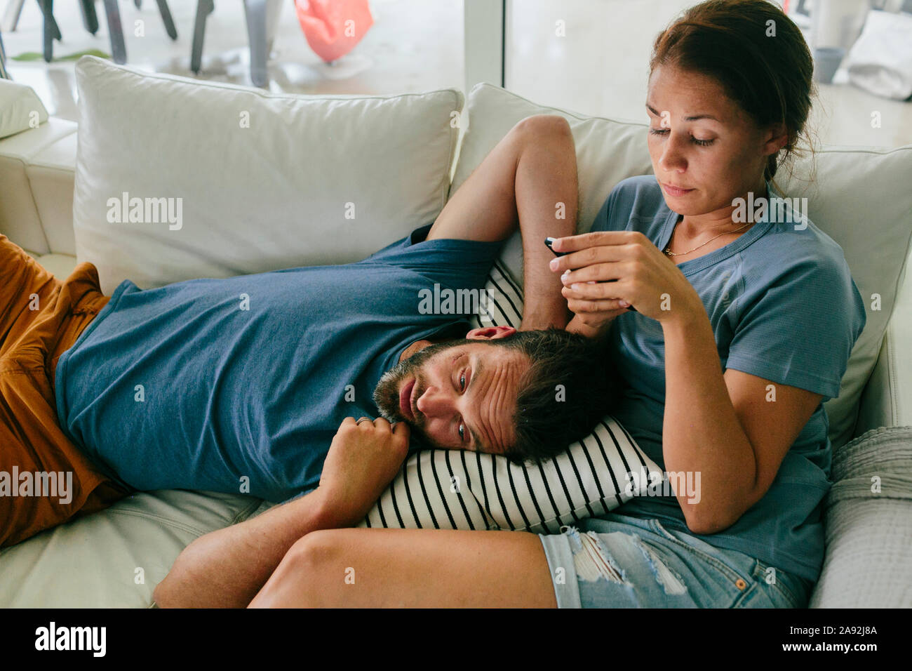 Couple on sofa Stock Photo