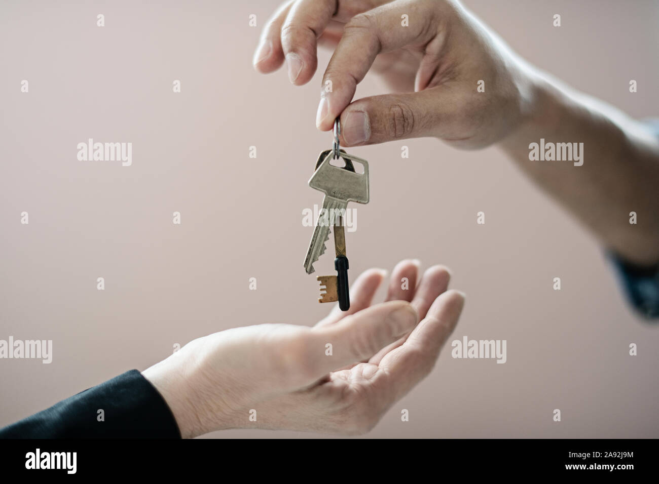 Hands with keys Stock Photo