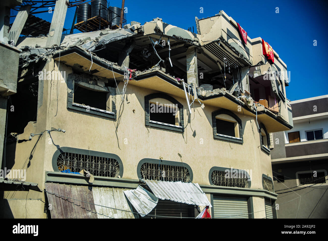 Tel Aviv, Palestinian Territories. 12th Nov, 2019. The house of the Islamic Jihad leader Baha Abu Al Ata damaged after an Israeli air raid. Israel's security forces have taken targeted action to kill the military chief of Islamic Jihad in the Gaza Strip. Israel declared that it would not return to a policy of targeted killing. According to the army, this had been a unique action to avert 'a direct threat'. Credit: Saud Abu Ramadan/dpa/Alamy Live News Stock Photo