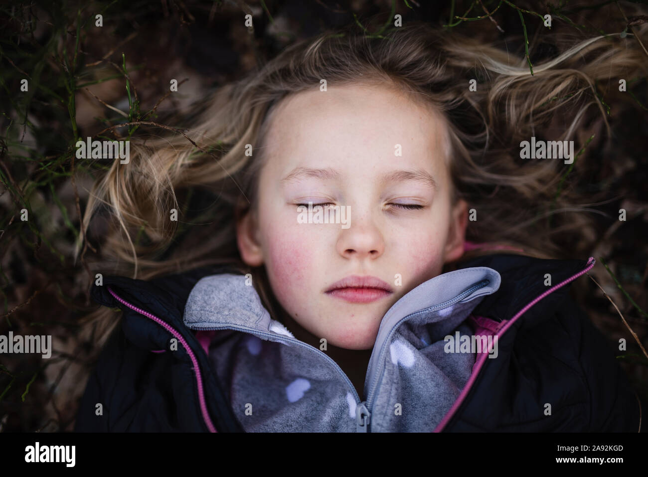 Girl with eyes shut Stock Photo