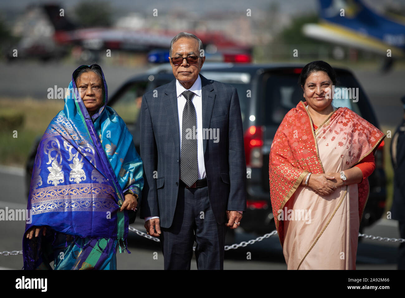 Kathmandu, Nepal. 20th Nov, 2019. President of Bangladesh, Abdul Hamid (c) and President of Nepal, Bidhya Devi Bhandari (R) and the first lady of Bangladesh Rashida Hamid (L) pose for pictures upon their arrival at Tribhuvan International Airport in Kathmandu. President of Bangladesh is on a three-day official goodwill visit to Nepal at the invitation of Nepal's President. Credit: SOPA Images Limited/Alamy Live News Stock Photo